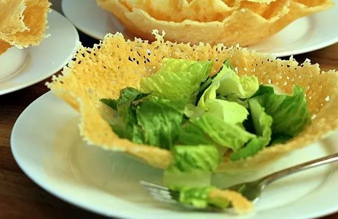 Crispy edible bowl with mixed greens salad.