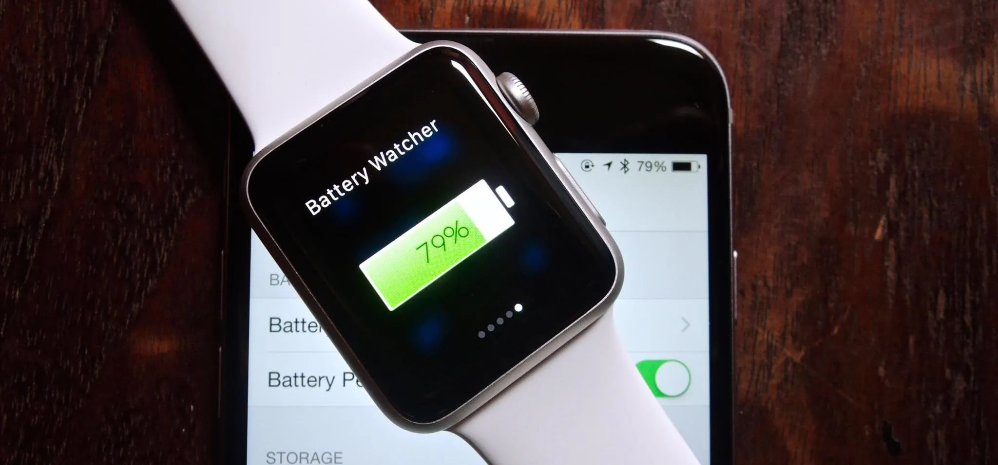 Smartwatch and smartphone displaying time and colorful app icons.