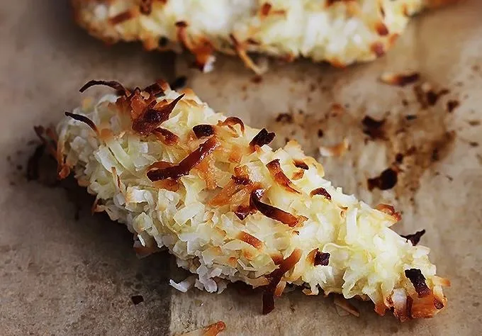 Crispy coconut macaroon on parchment paper.