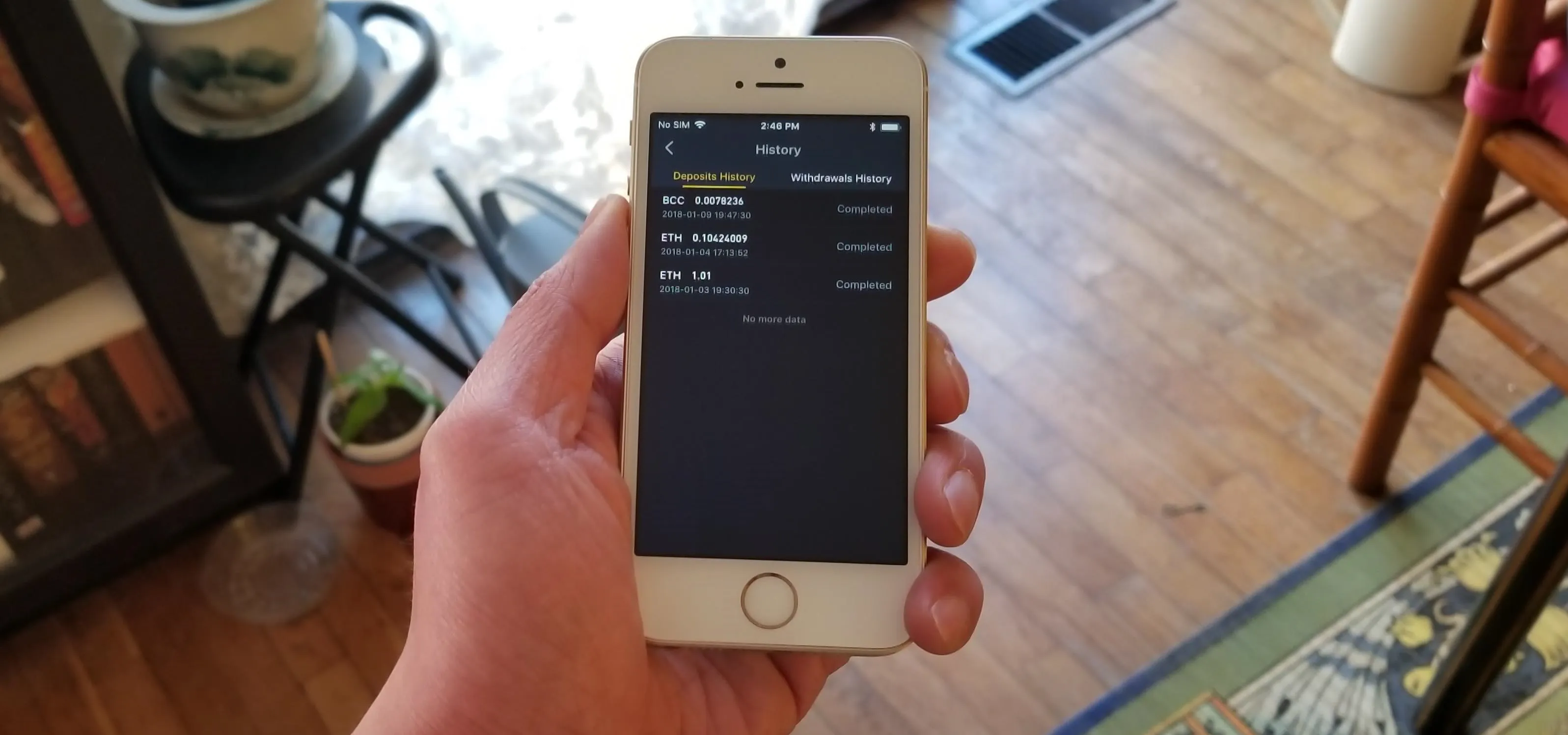 Mobile phone displaying settings menu in a home environment.