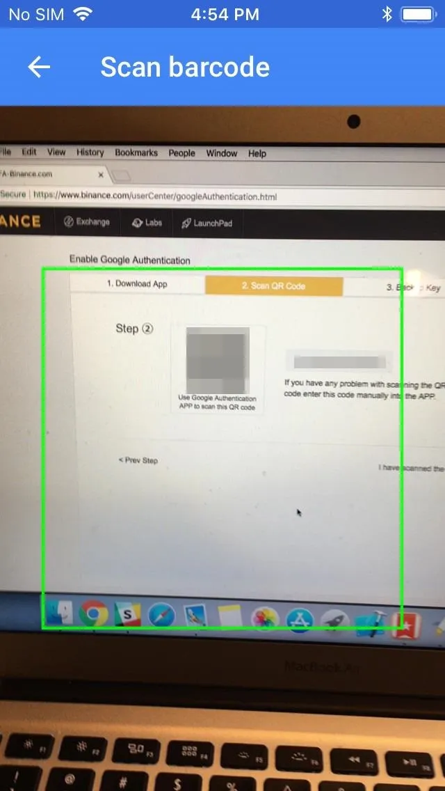 Scan barcode interface on a laptop screen.