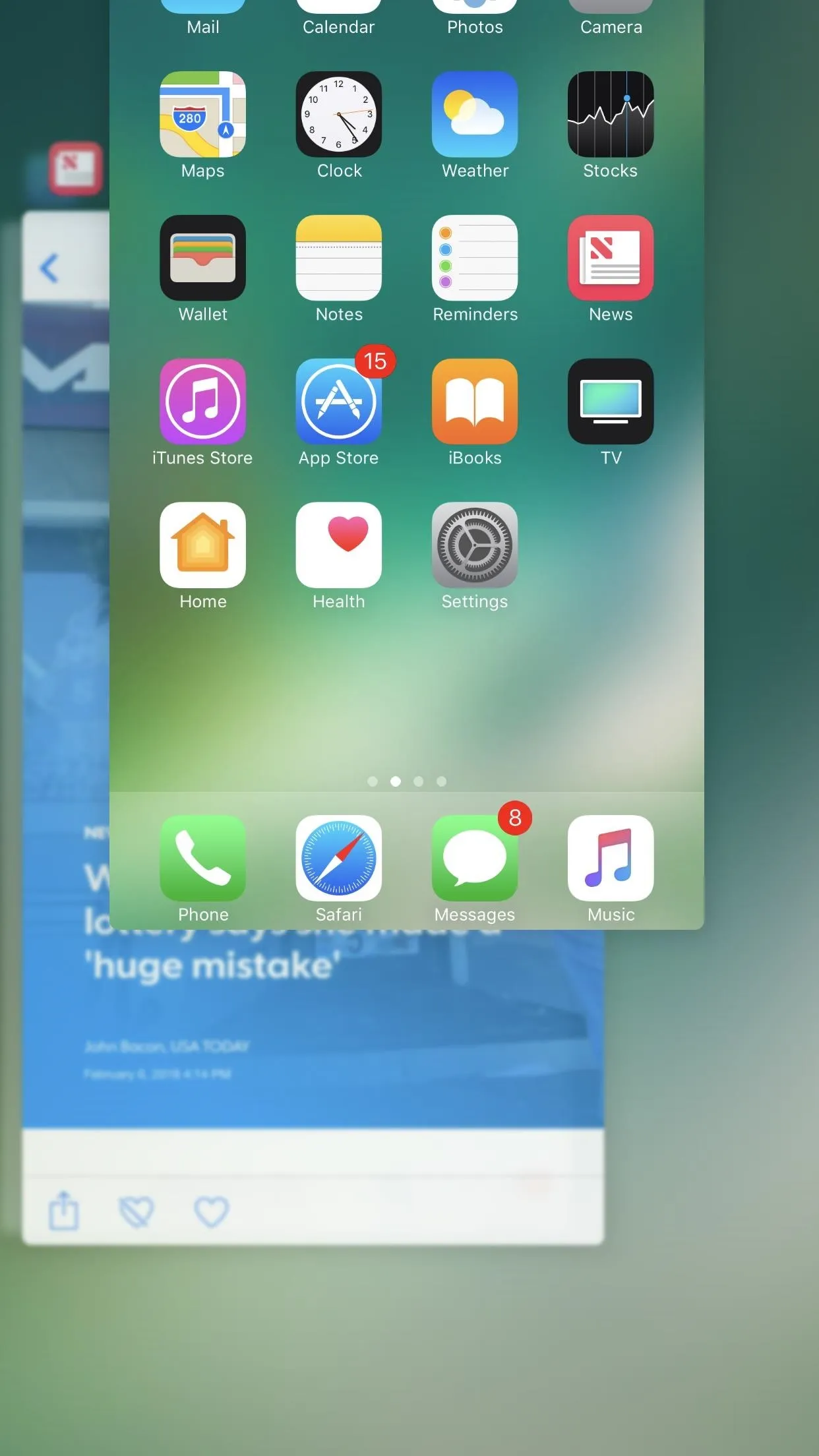 A smartphone screen displaying app icons and a multitasking view.