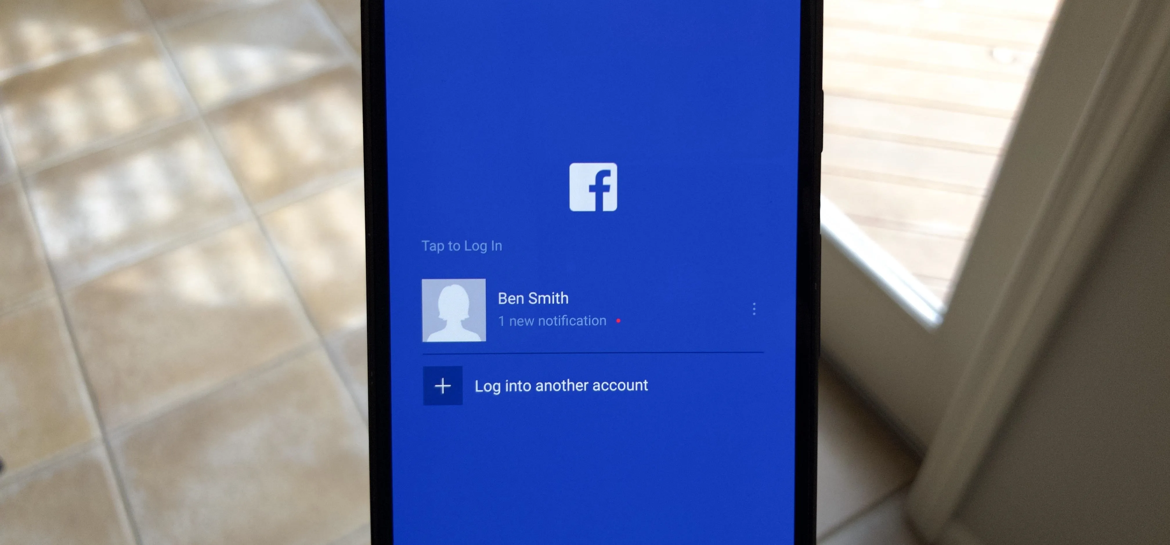 Facebook login screen on a smartphone.