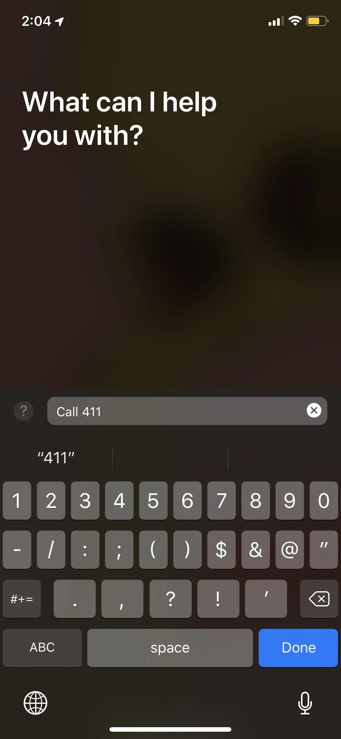 Text input interface with the prompt "What can I help you with?" and a virtual keyboard displayed.