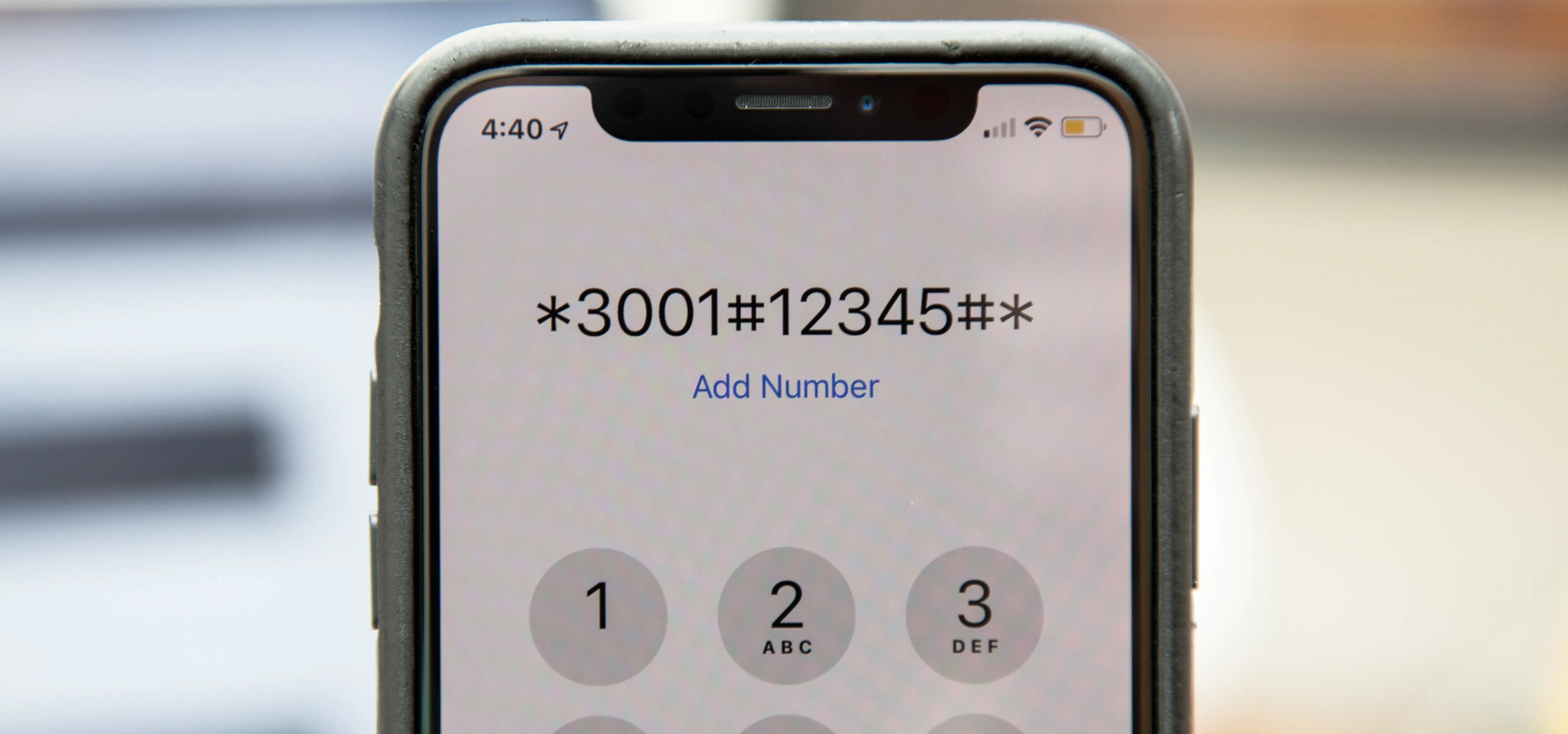 Phone screen displaying a dial pad with the number *3001#12345** input.