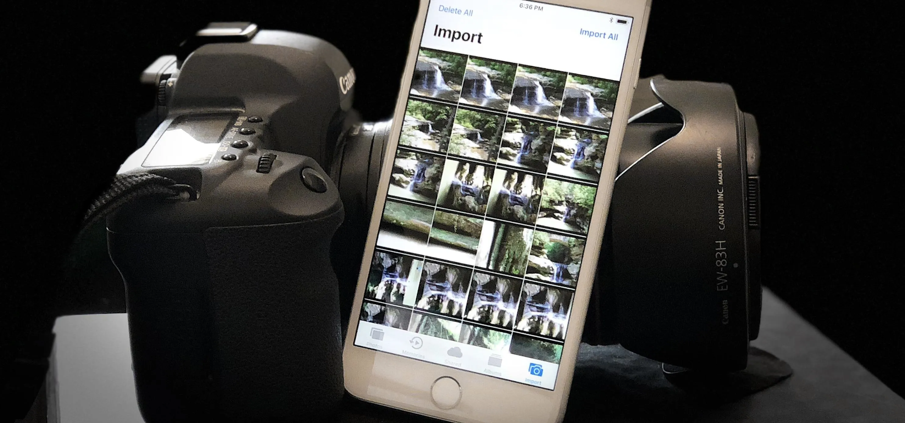 Camera with a smartphone displaying imported photos.