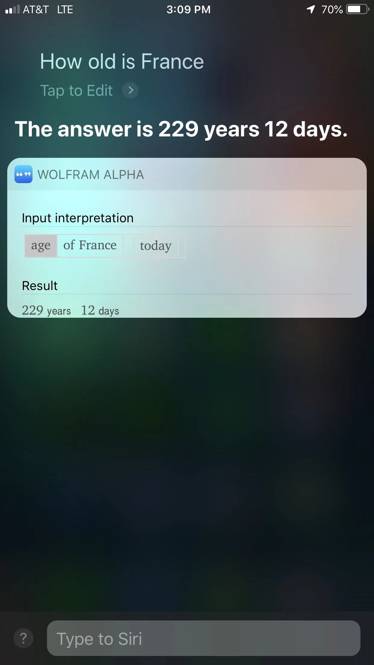 Screen displaying a voice assistant response about the age of France.