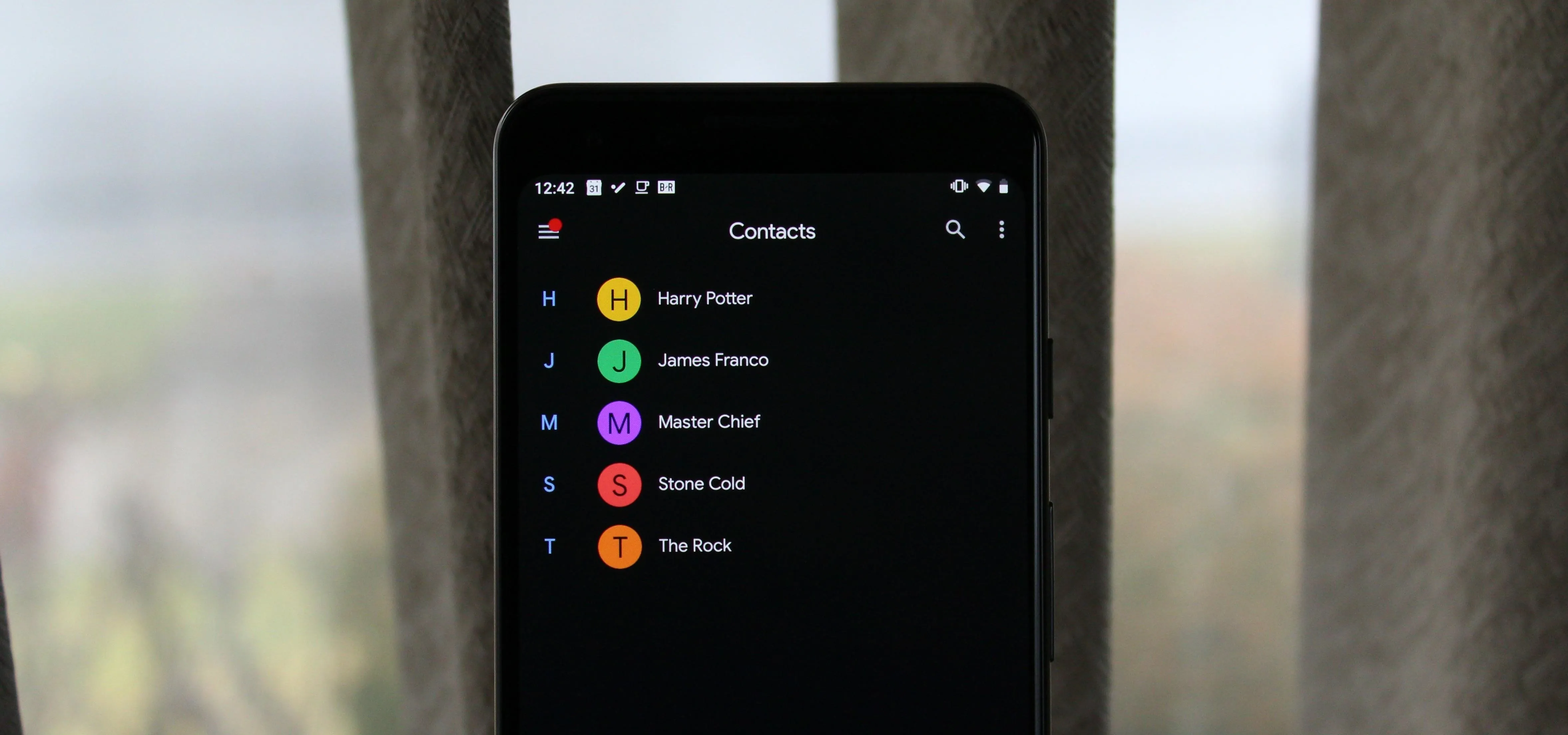 Contacts list displayed on a smartphone screen.