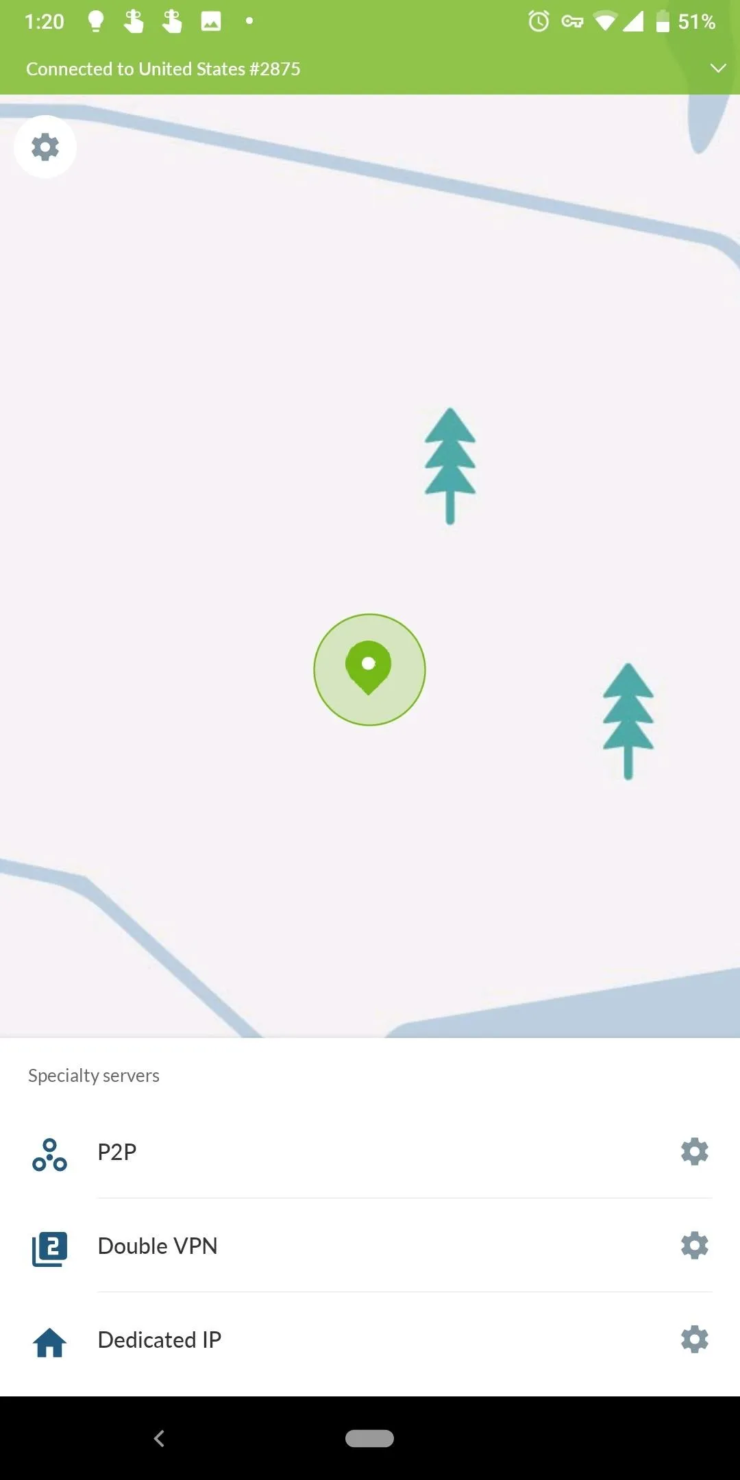 Map interface displaying a location marker surrounded by trees.