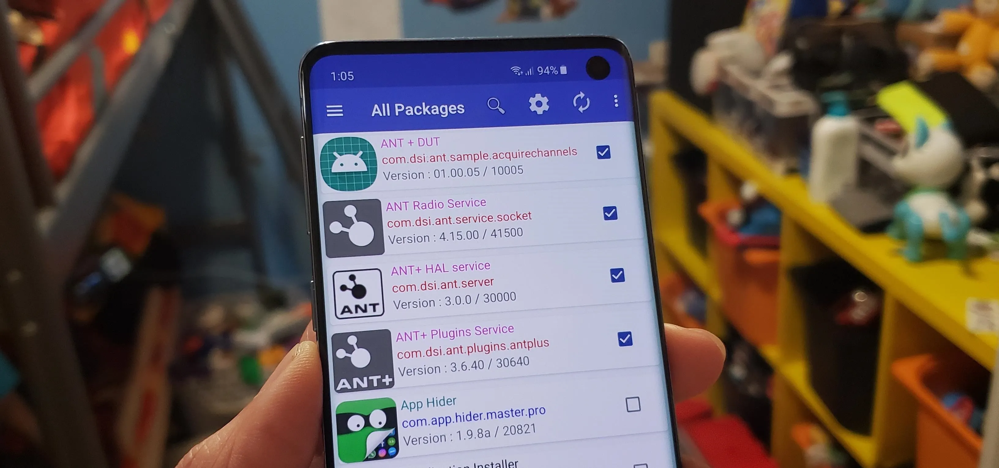 Mobile phone displaying a list of package management options in an app.