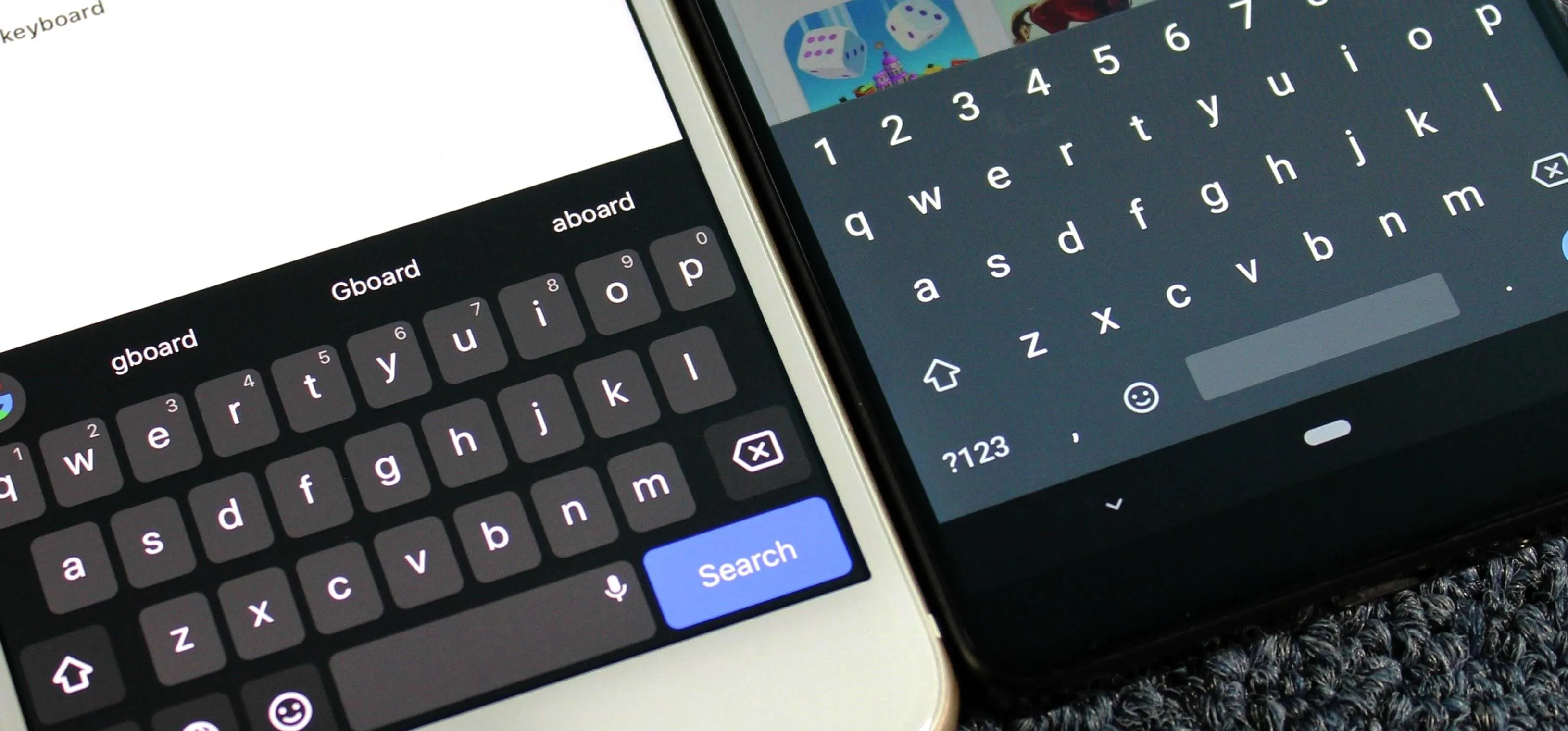 Smartphones displaying a search interface and virtual keyboards.