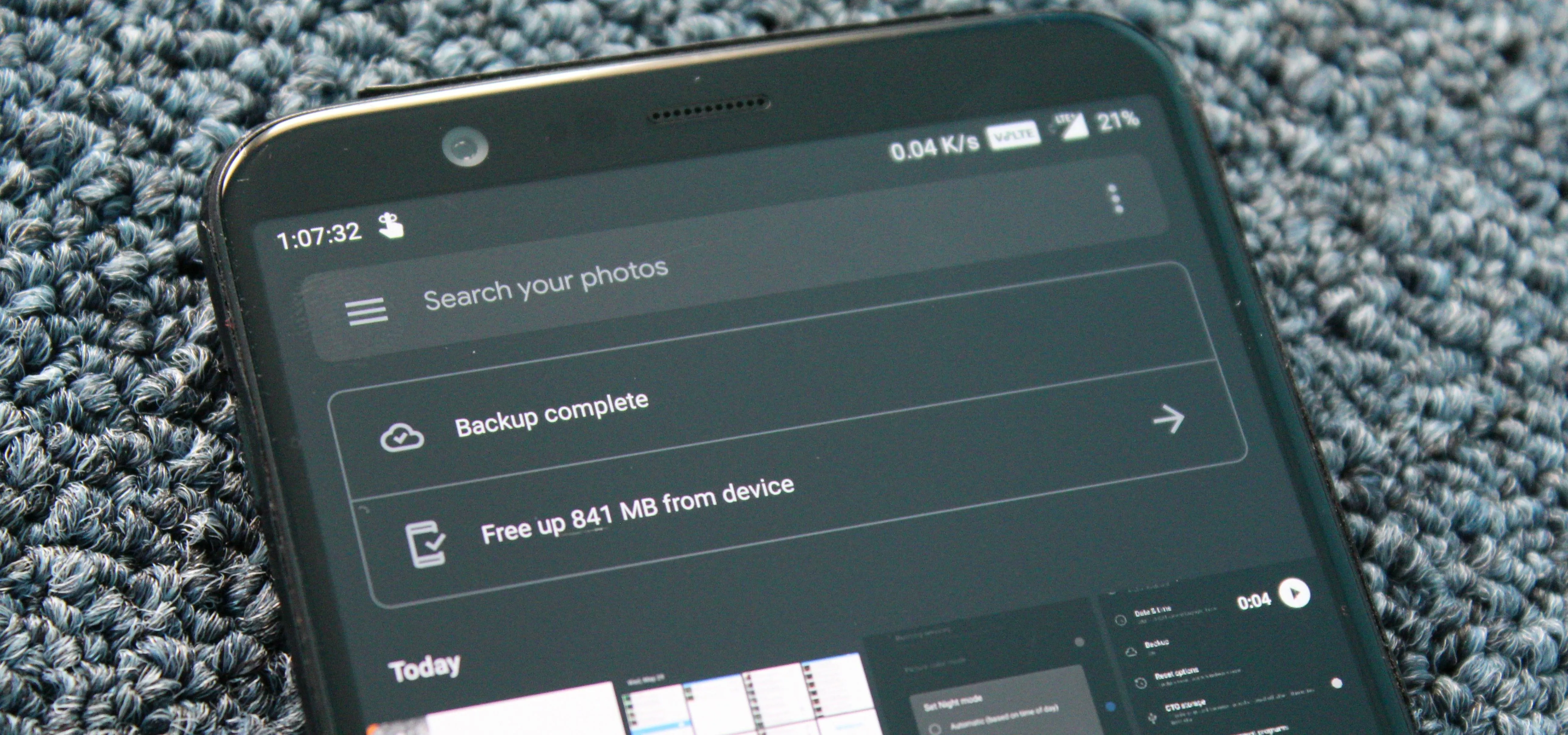 Mobile device screen displaying a photo search interface.
