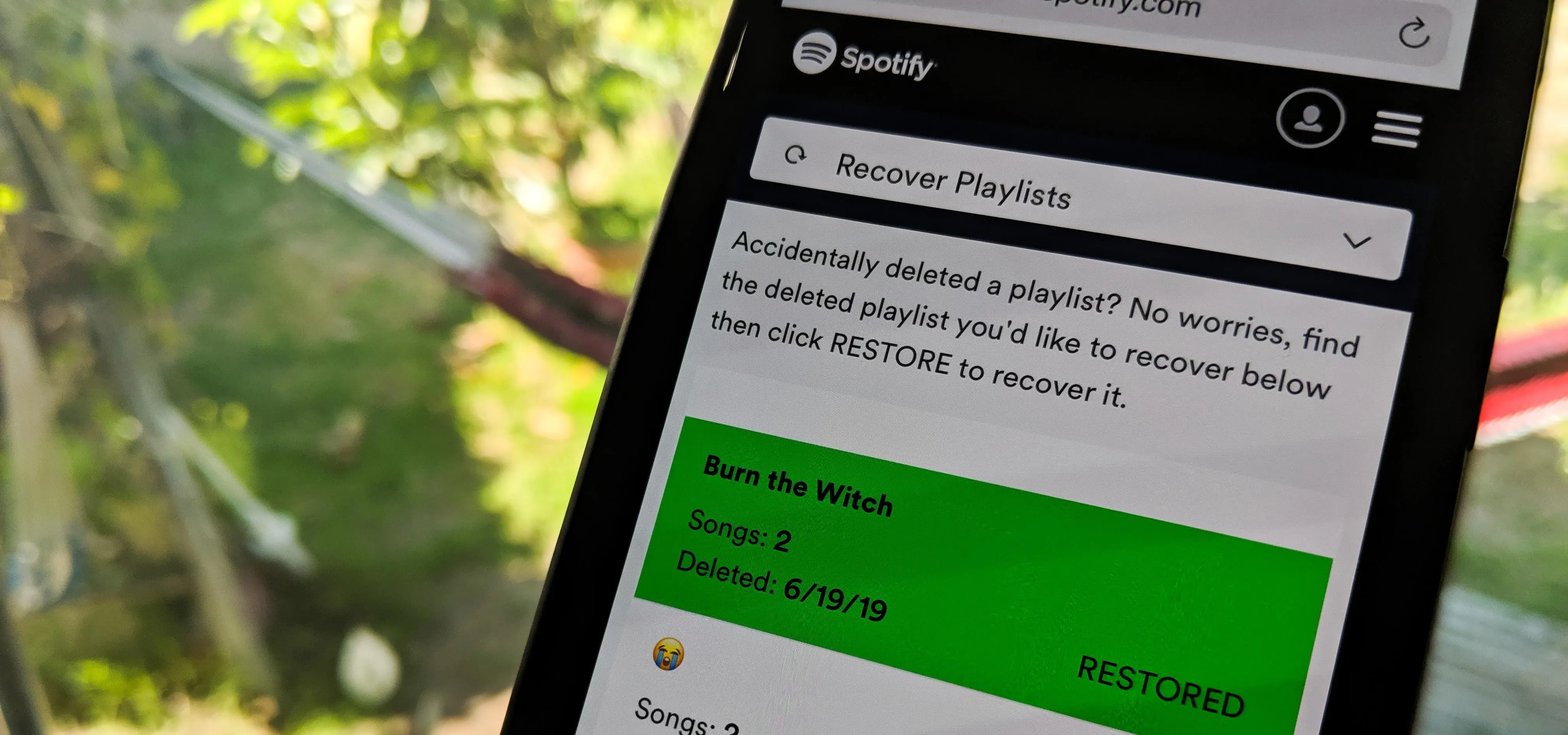 Spotify app interface displaying a playlist recovery option.