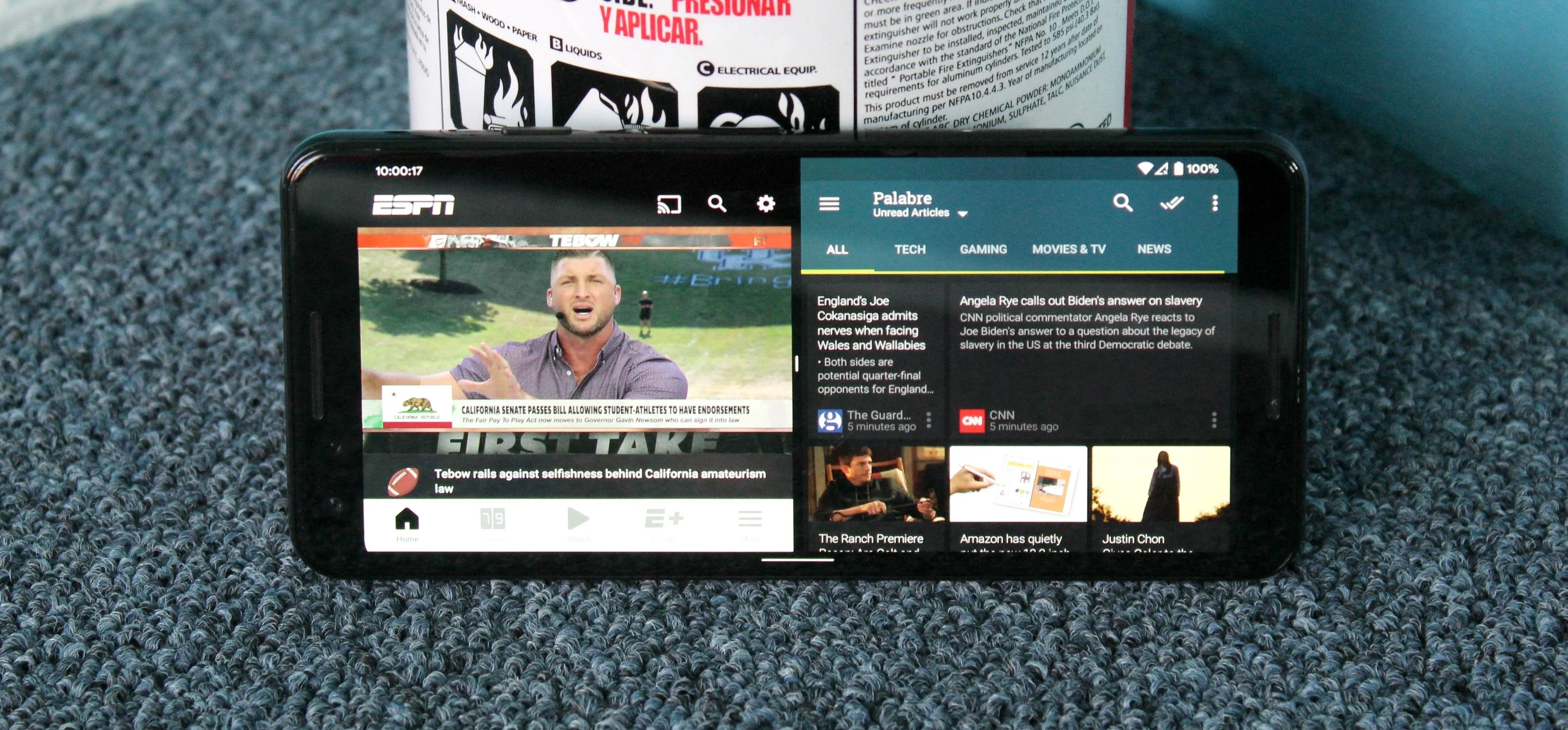 Smartphone displaying a split screen with sports content and a video streaming platform.