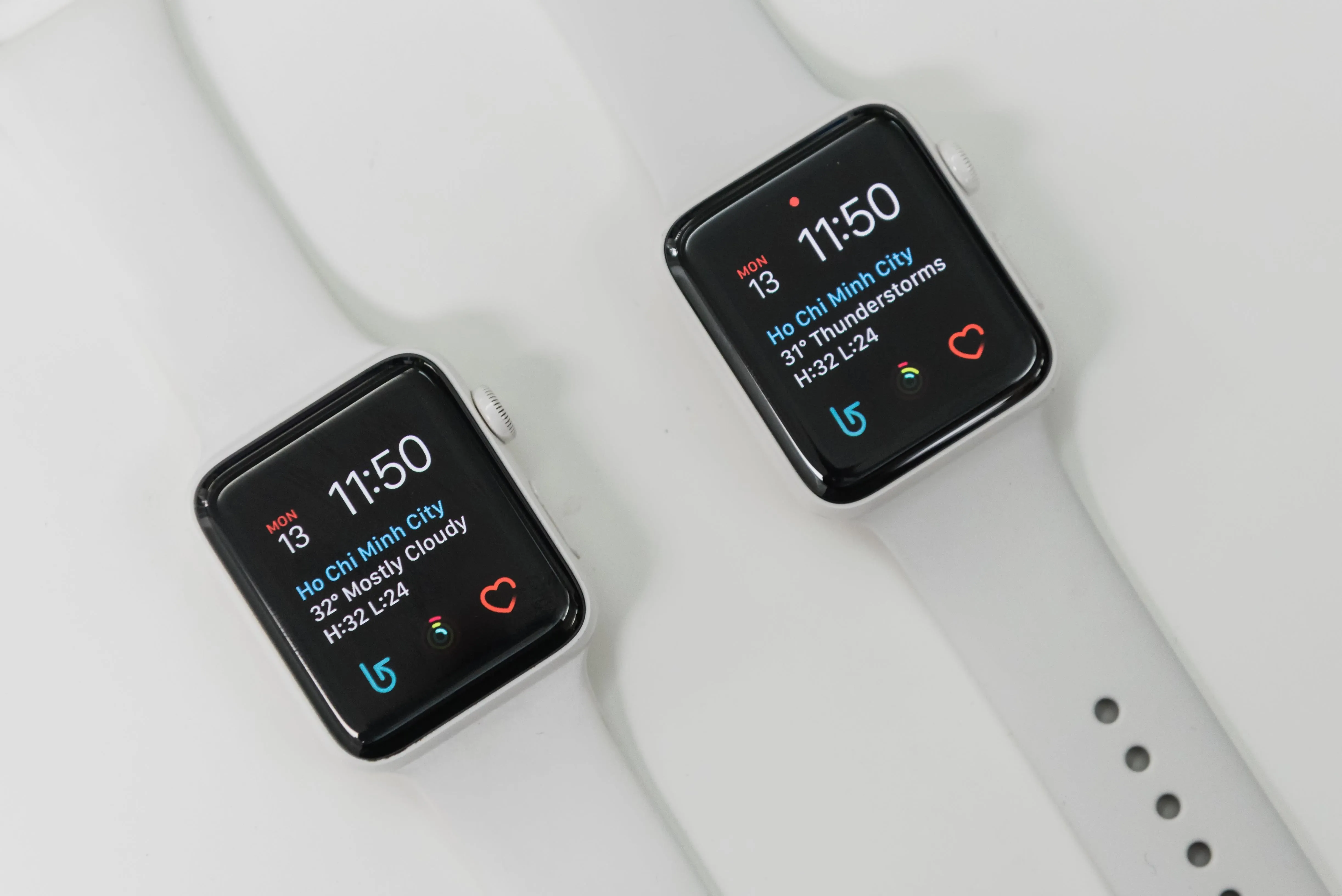 Smartwatches on a white background displaying time and notifications.