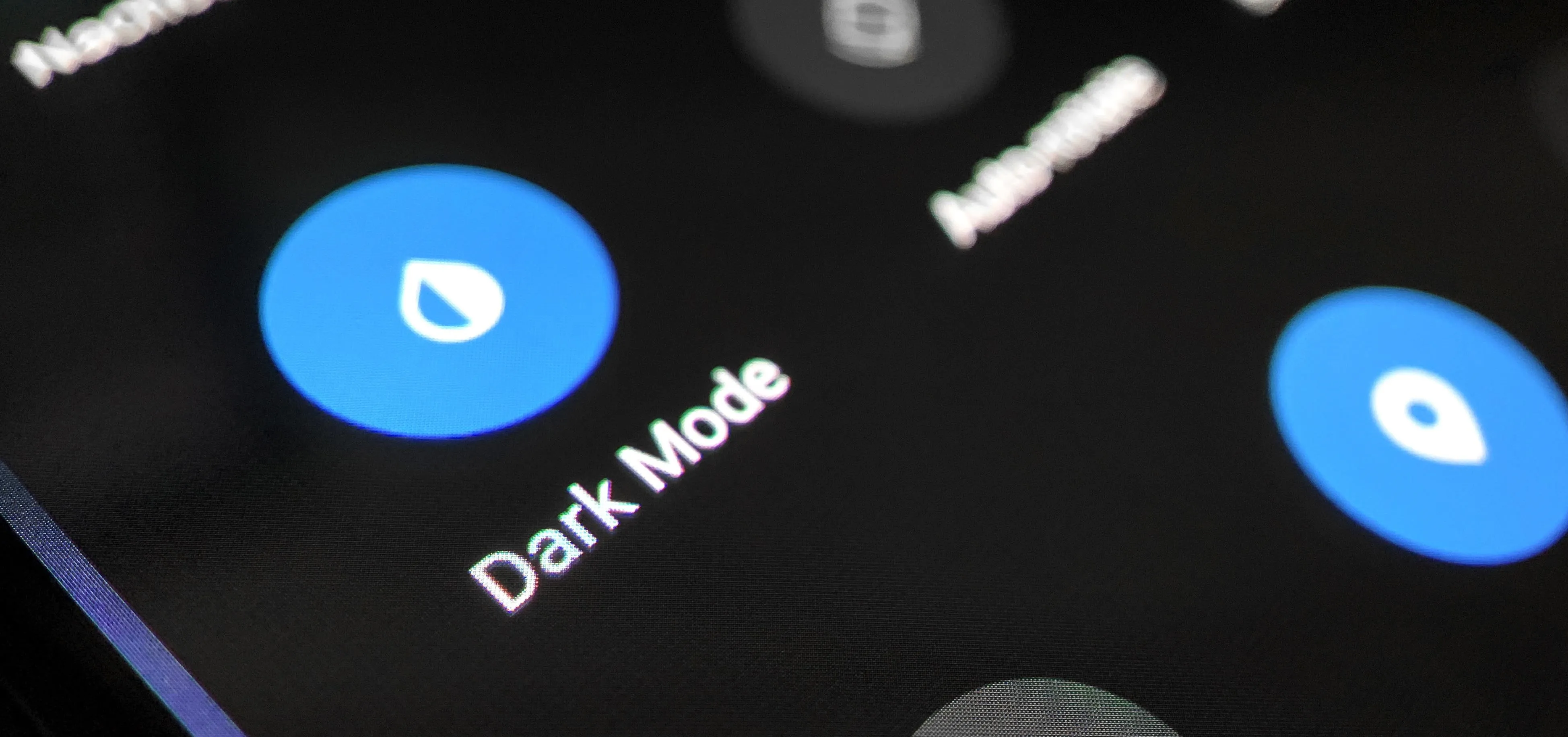 Dark mode toggle button on a mobile interface.