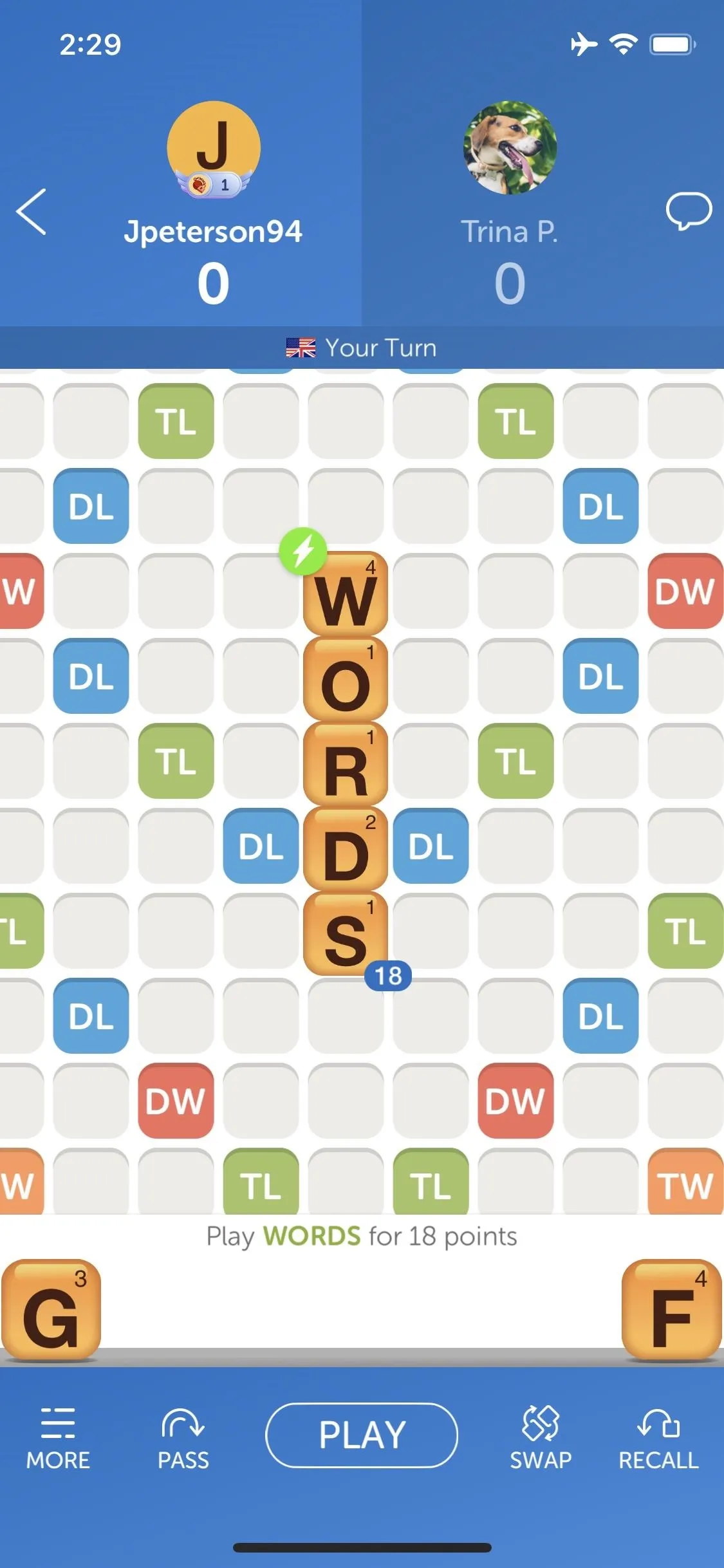 Scrabble game board showing the word "WORDS" positioned vertically.