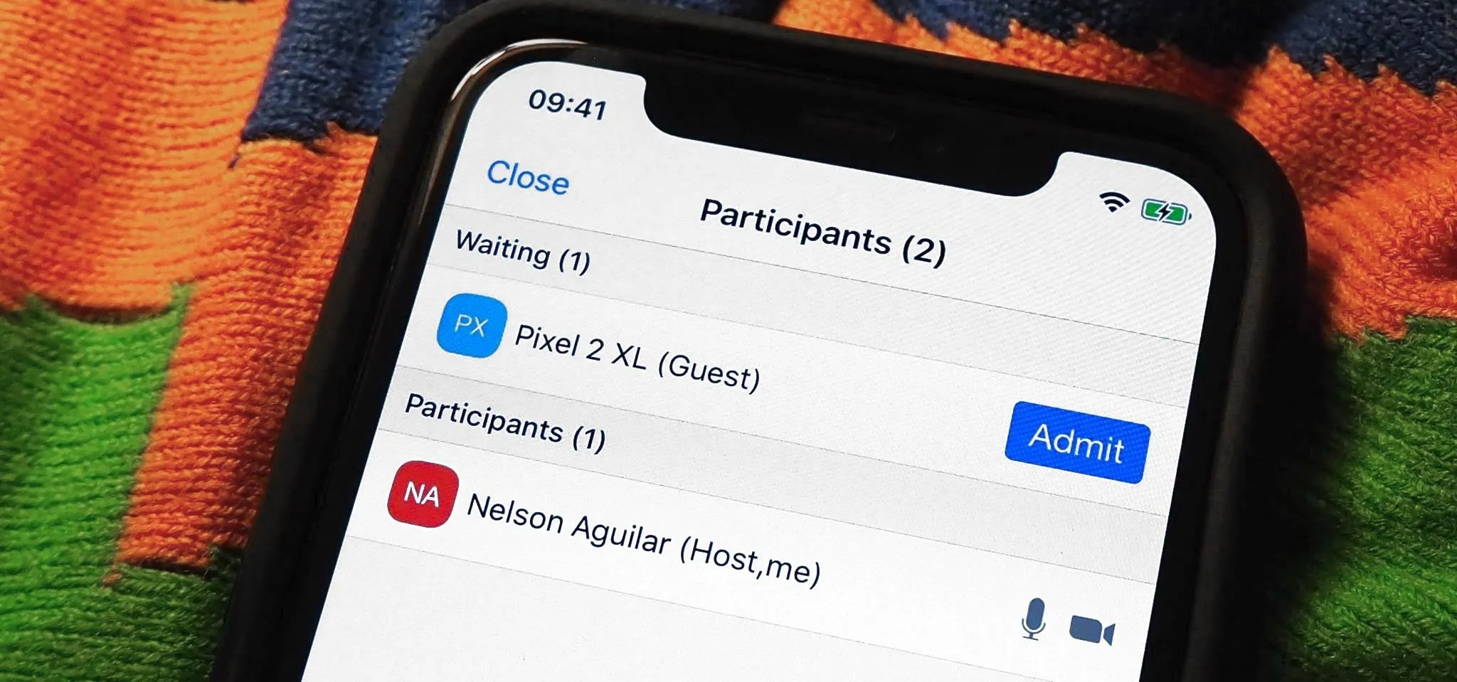 Mobile screen displaying participation details for a meeting.