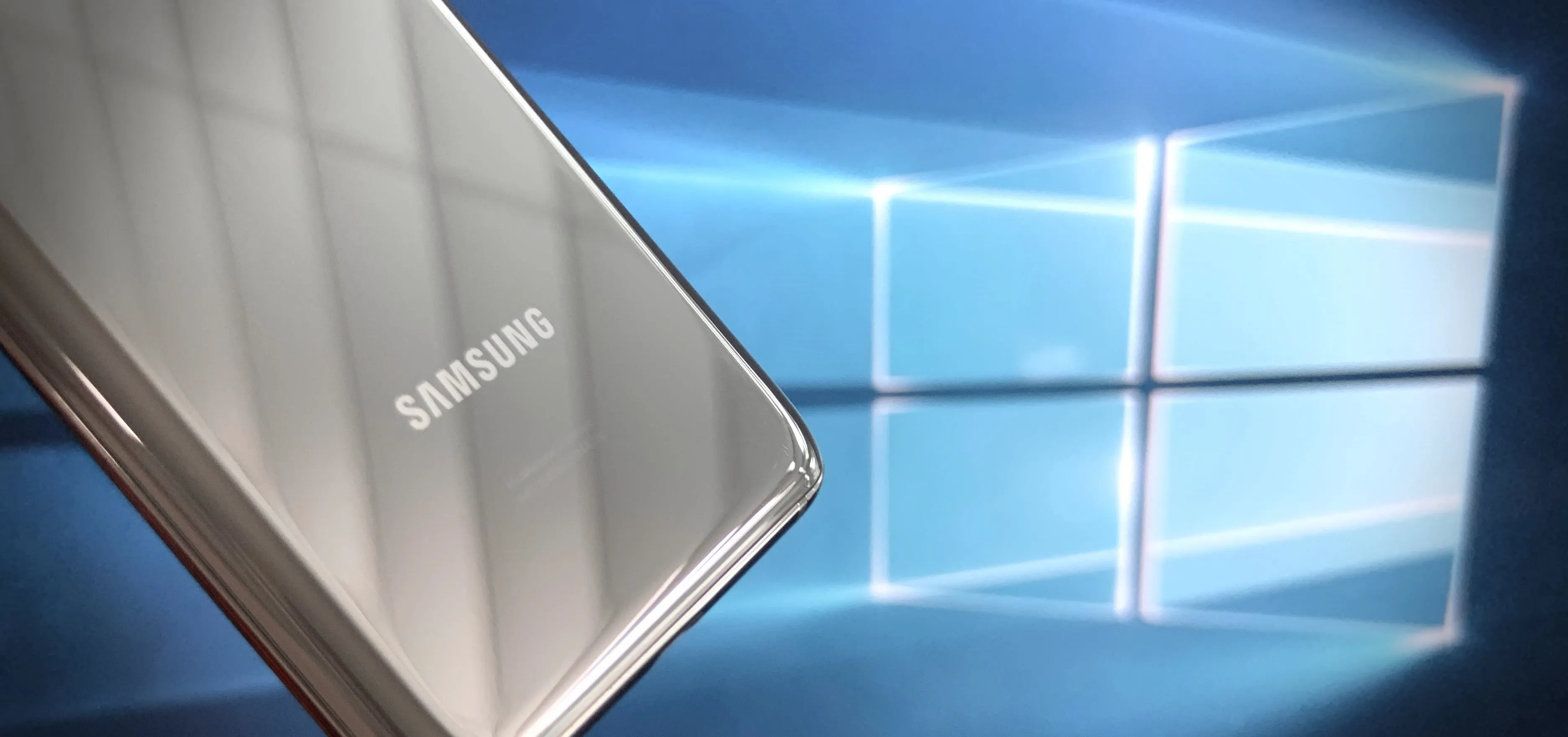 Samsung device in front of a Windows background.