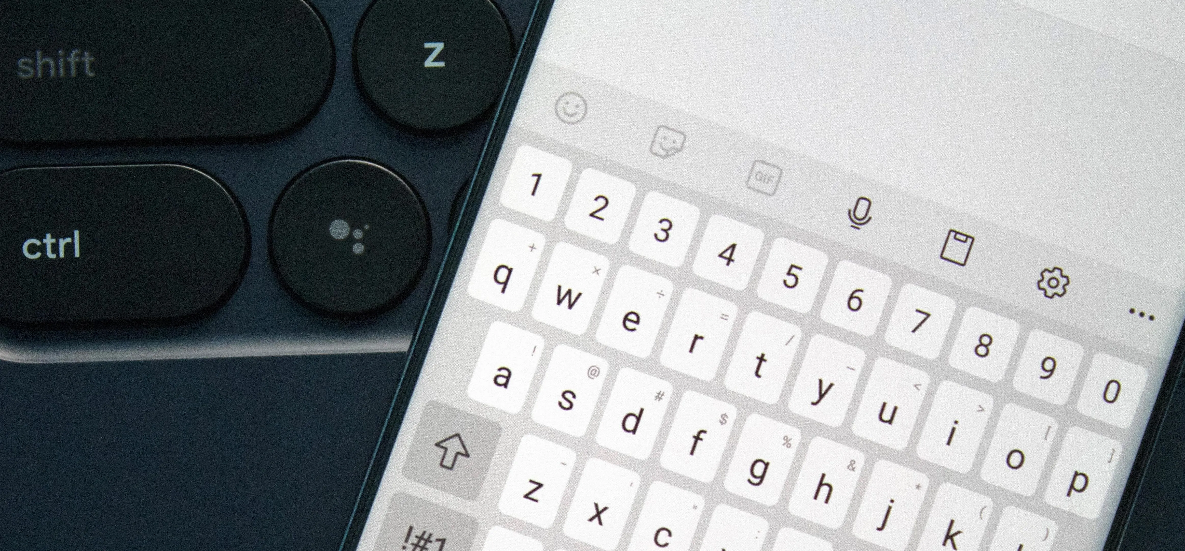 Close-up of a smartphone screen displaying a virtual keyboard.