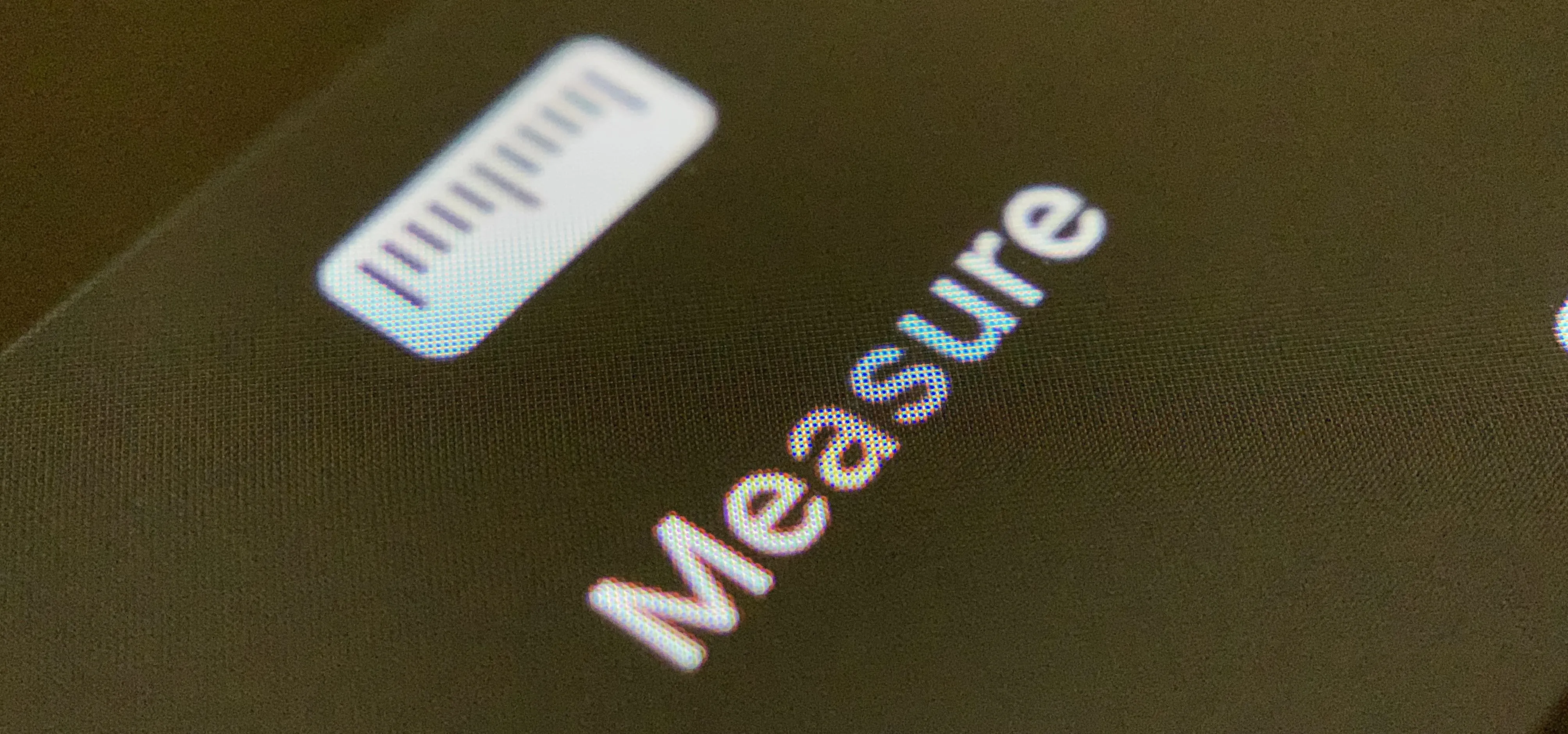 "Close-up of a screen displaying the word 'Measure'."