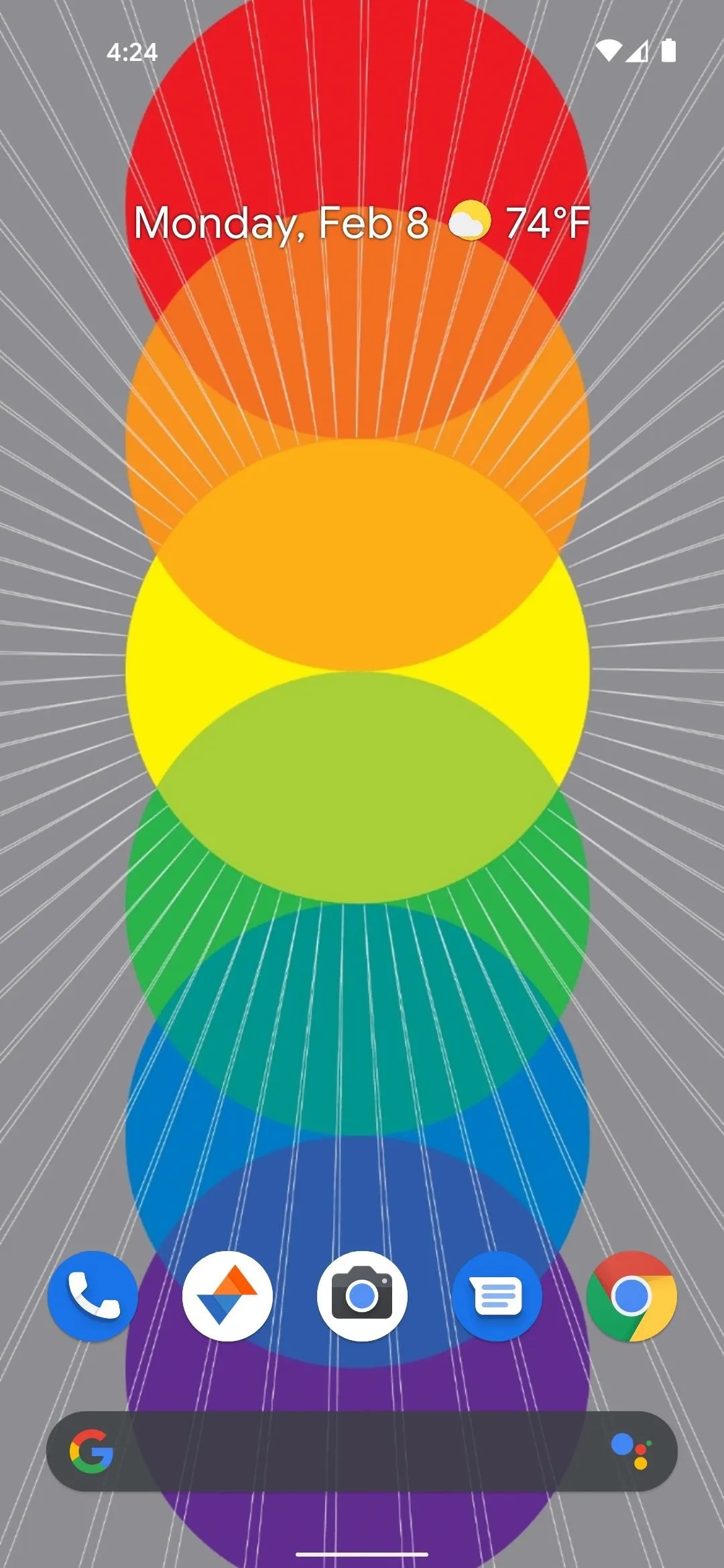 Colorful rainbow circles against a gray background.