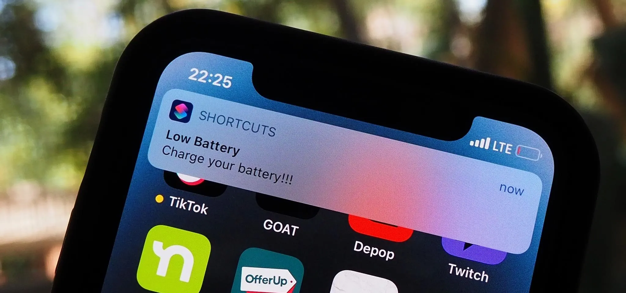 Low battery notification on a smartphone screen.