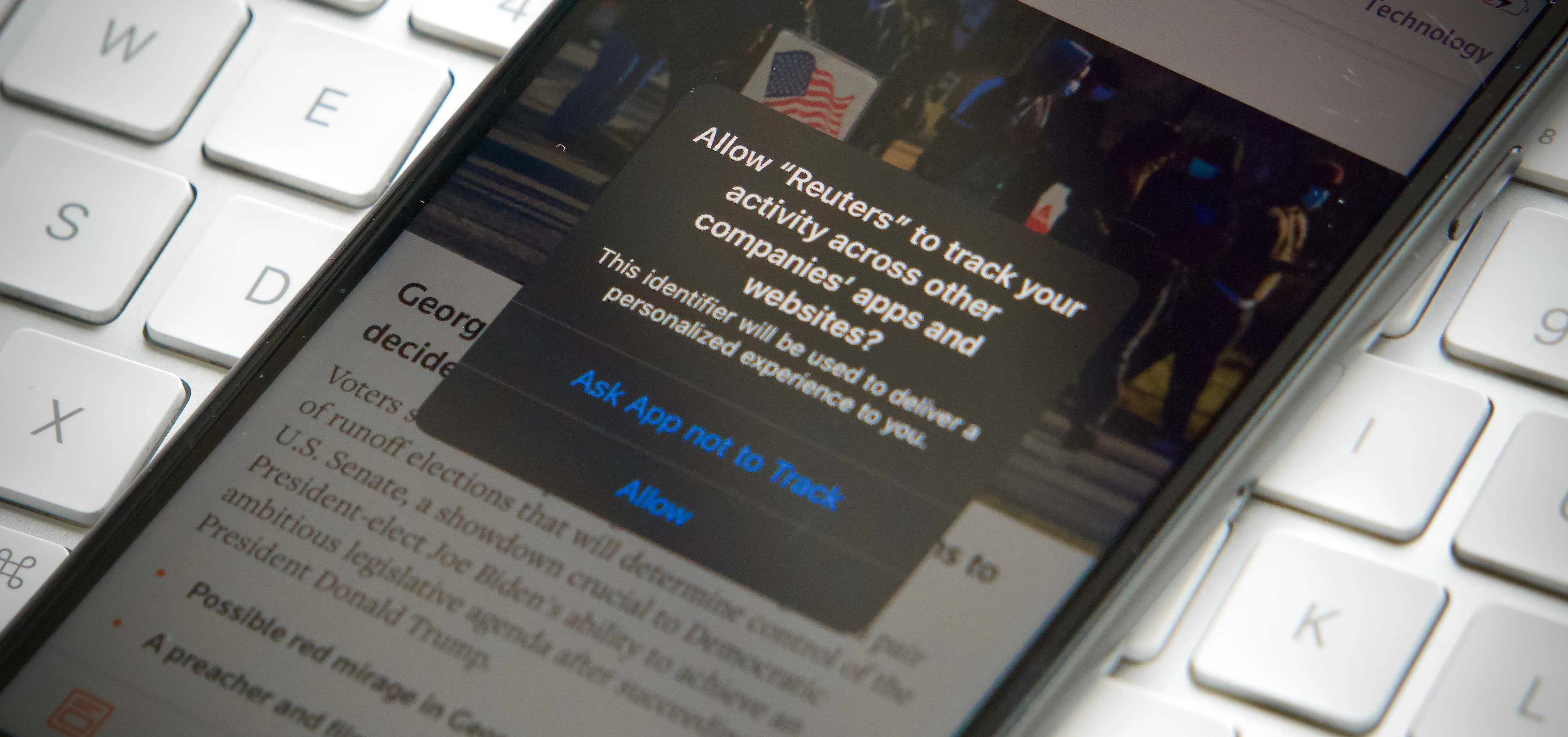 Mobile phone displaying a pop-up message related to user account access.
