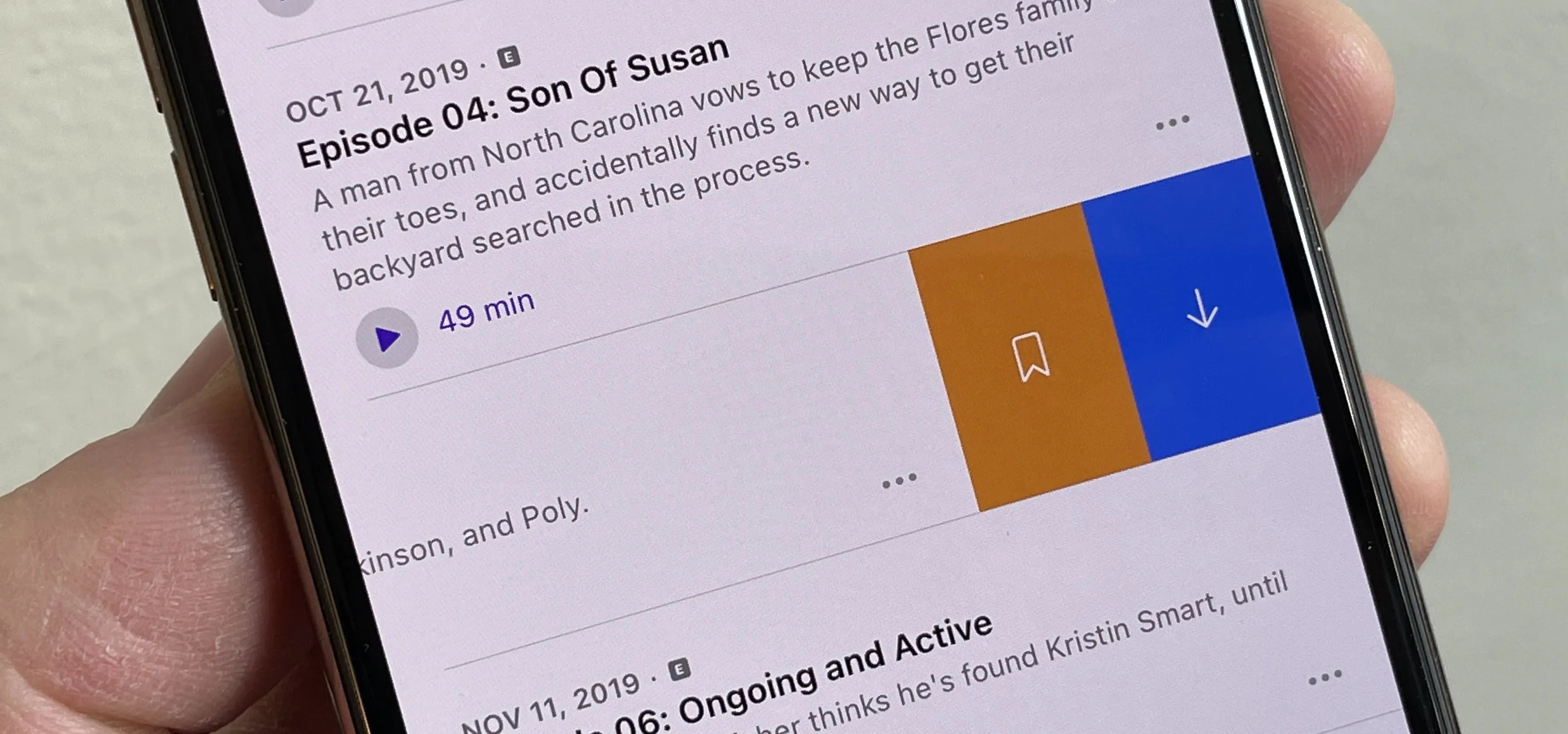 Podcast episode details displayed on a smartphone screen.