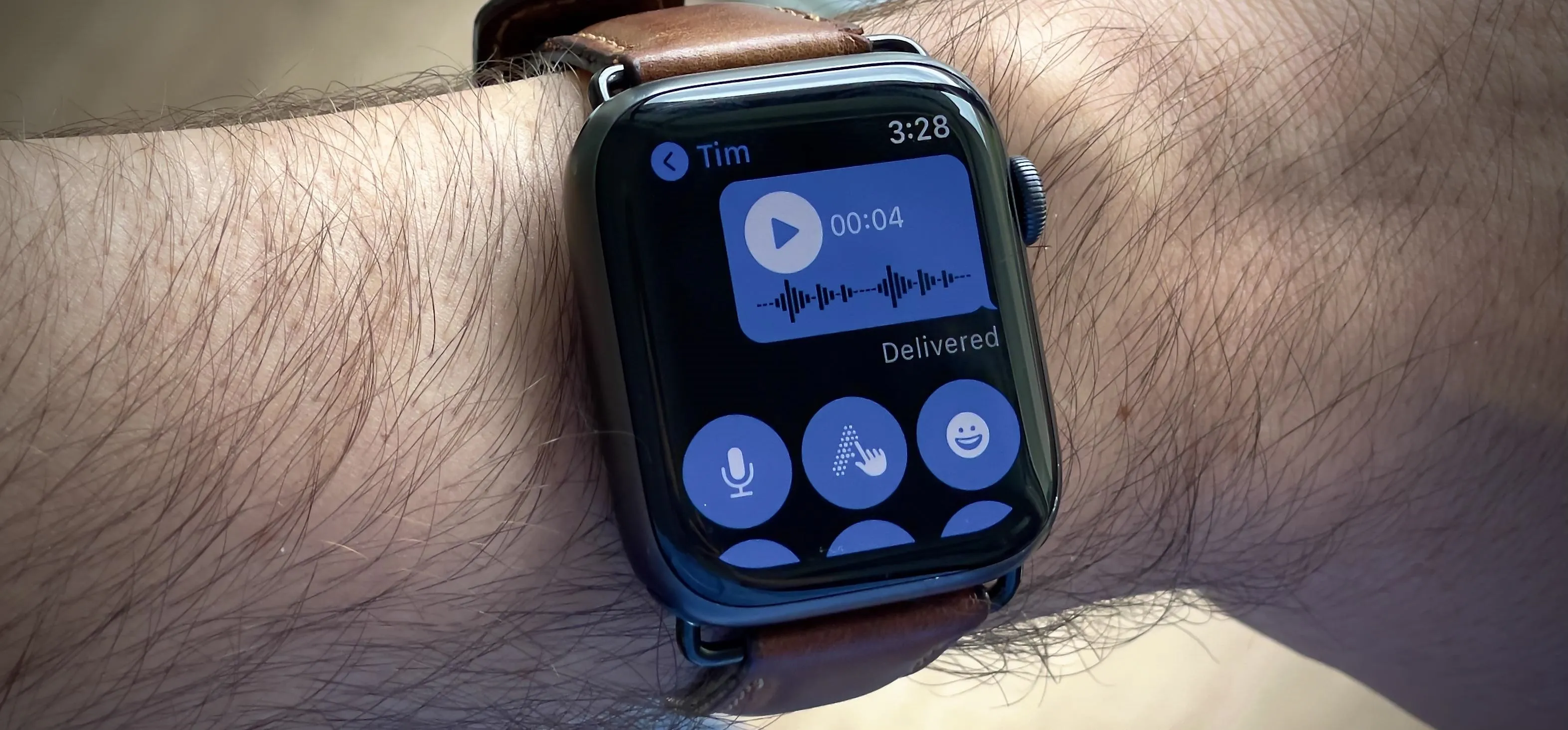 Smartwatch and smartphone displaying time and colorful app icons.