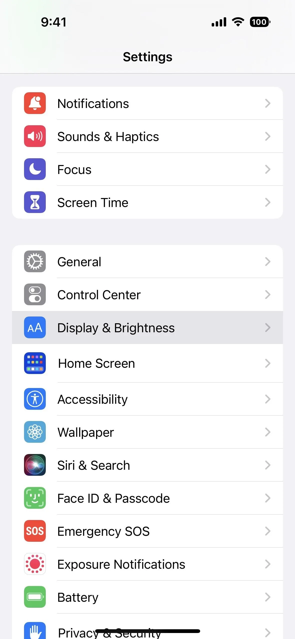 Settings menu on a smartphone displaying various options including Notifications, Focus, and Display settings.