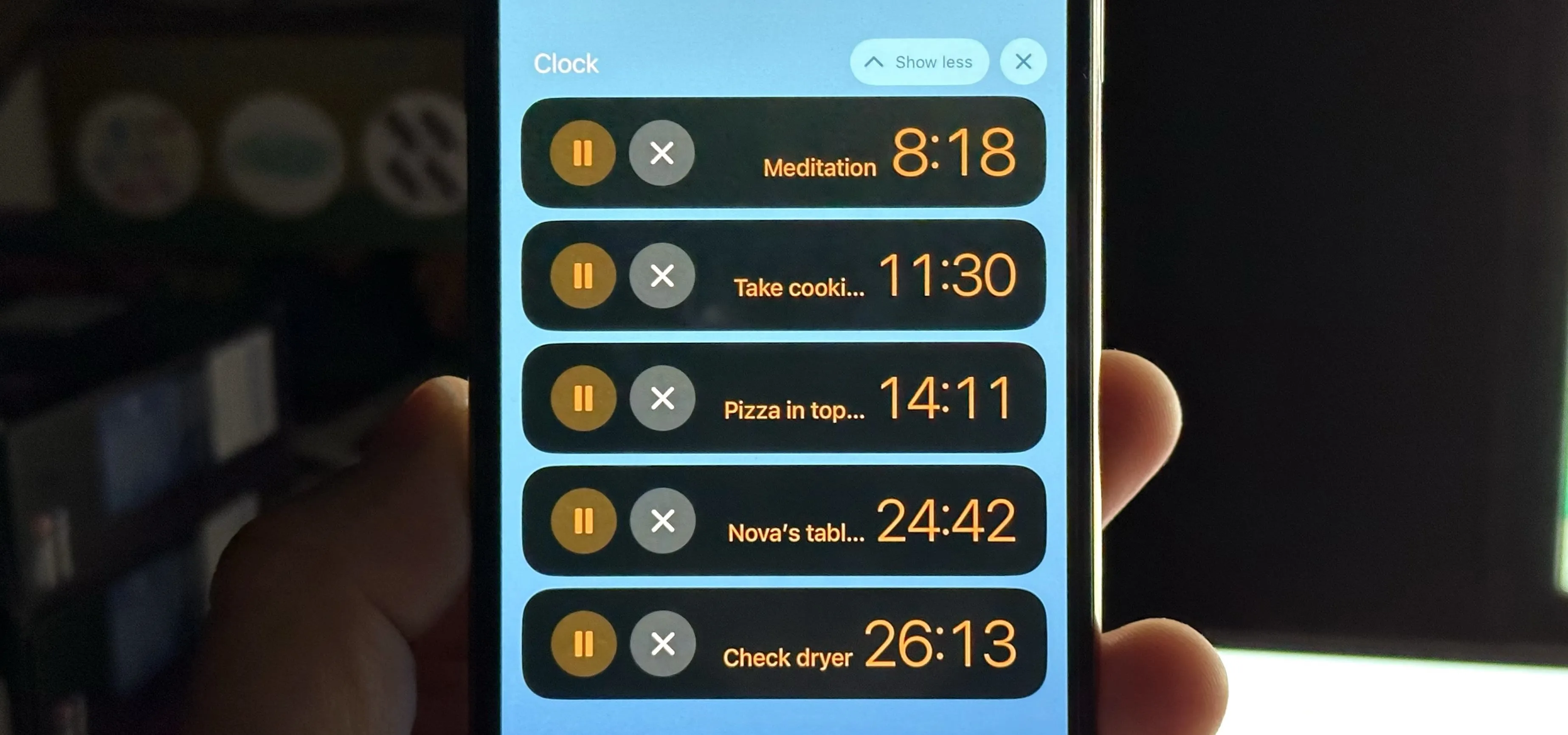 Alarm clock app displaying several timers with different durations.