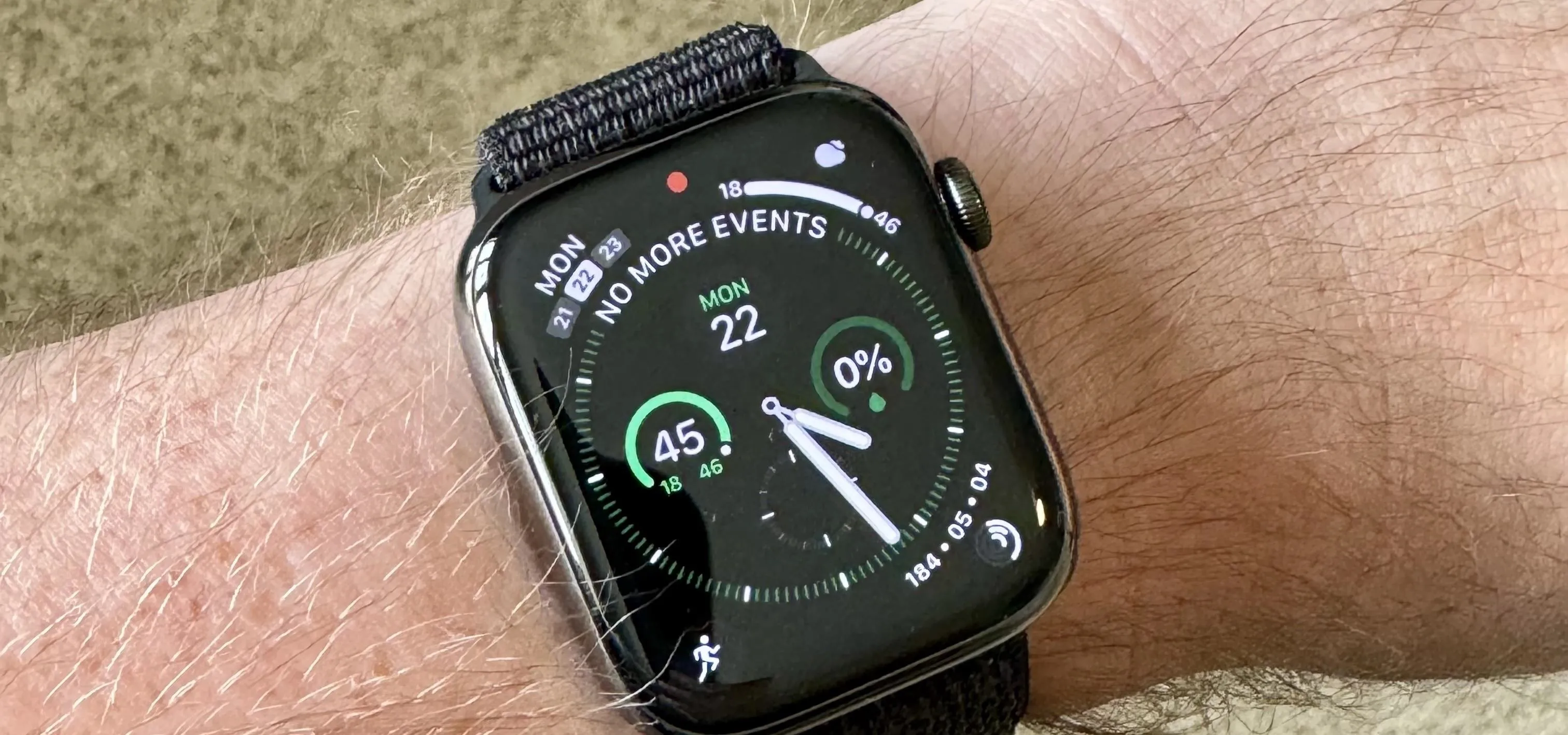 Smartwatch and smartphone displaying time and colorful app icons.
