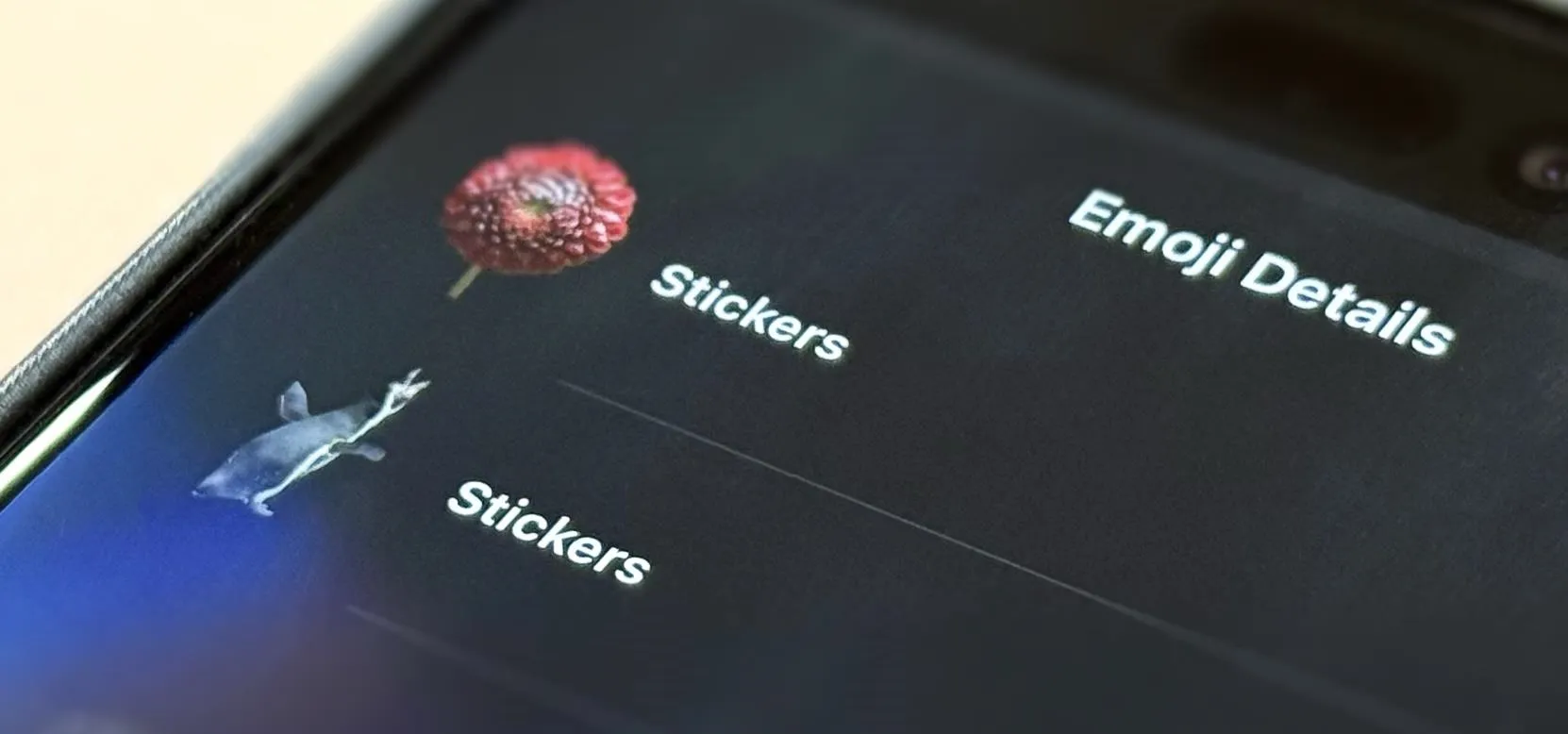 Emoji details featuring stickers of a balloon and a giraffe.