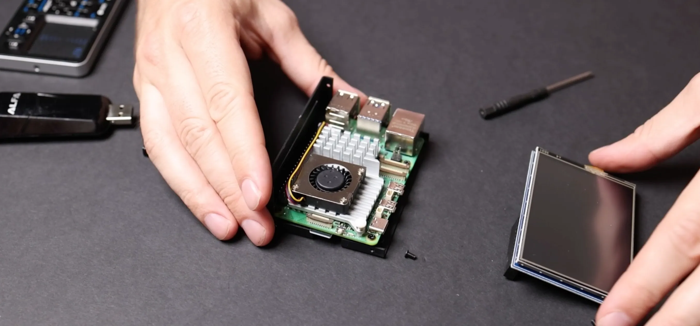 Adding a Raspberry Pi 5 microcontroller with an active cooler heatsink/fan to an aluminum TFT enclosure.
